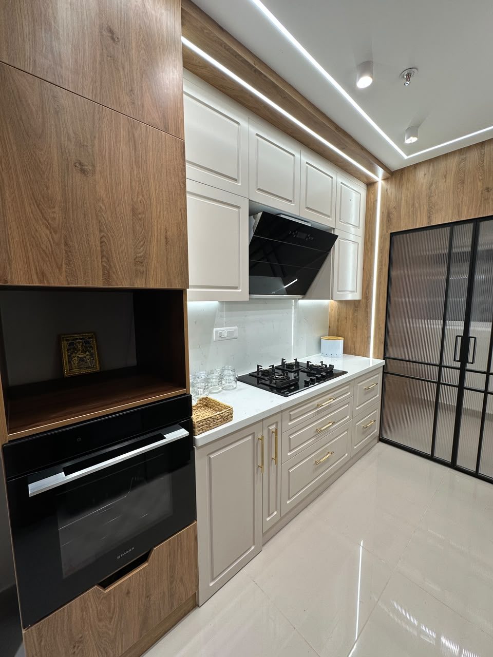 Modular kitchen with wood finish and breakfast counter